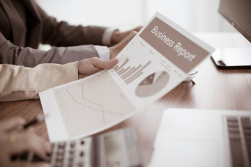 Business people discussing the charts and graphs showing the res