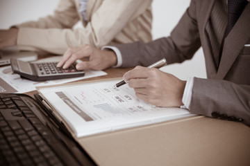 Business people discussing the charts and graphs showing the res