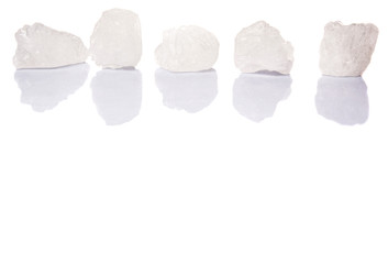 Rock sugar over white background