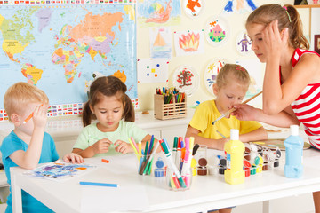 Fototapeta premium Children draw in the classroom