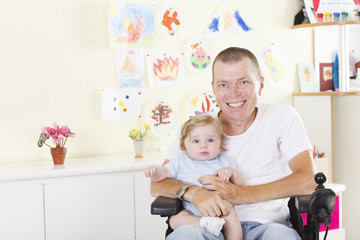 Fototapeta premium Disabled man with his son
