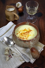 French cuisine: garlic soup and a wineglass