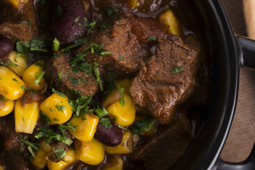 Tasty winter traditional hot pot stew with meat and vegetables