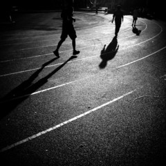 silhouette people jogging and walking