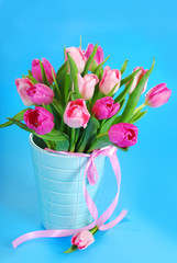 bunch of pink tulips in vase