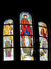 Stained glass depicting religious persons in the ancient temple