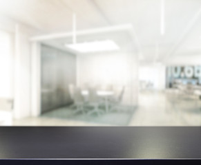 Fototapeta premium Table Top And Blur Office Background