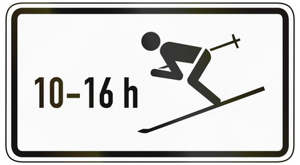 German traffic sign additional panel to specify the meaning of other signs: Skiers allowed to cross road from 10:00 to 16:00