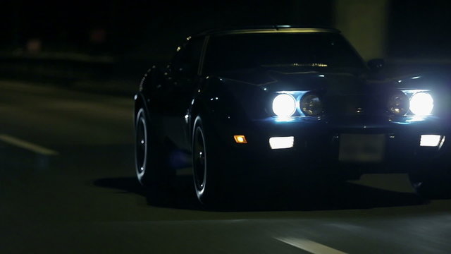 Frontal shot of car with headlights turned on