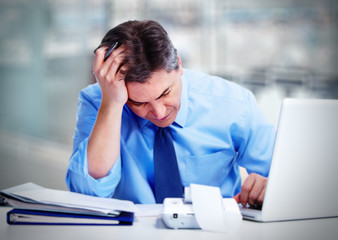 Man having migraine headache.