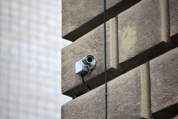 outdoor surveillance video camera in the wall