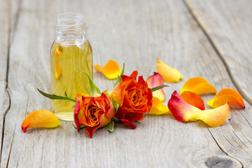 bath oil and orange roses