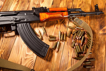 Kalashnikov assault rifles with ammunition - obrazy, fototapety, plakaty