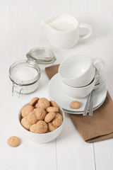 Amaretti Biscuits. Kitchenware. White Wooden Table