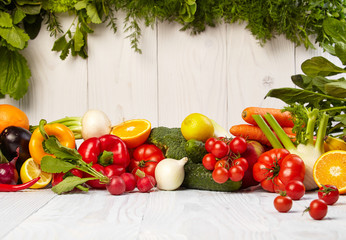 Fruit and vegetable borders on white wooden old table