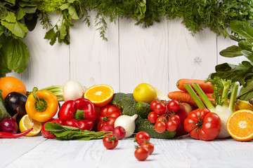 Fruit and vegetable borders on white wooden old table