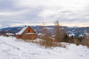 Mountain cottage  in winter.  Silesian Beskids Mountains, Poland