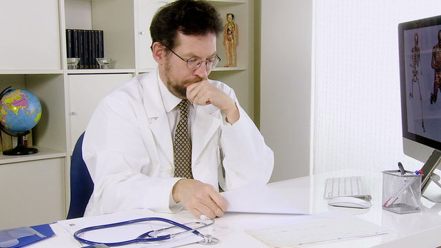 Young doctor in office worried