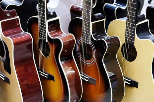 Guitars in the store background