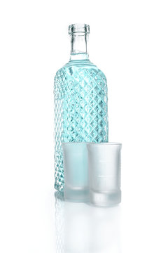 Bottle of vodka or alcohol with wineglass