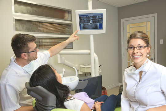 A dental office with employee and client