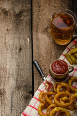 Onion rings, hot dip, french fries and Czech beer