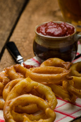 Onion rings, hot dip, french fries and Czech beer