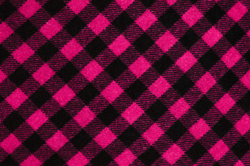 Magenta pink checkered wool fabric.Gingham pattern as background