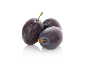 Ripe plums isolated.