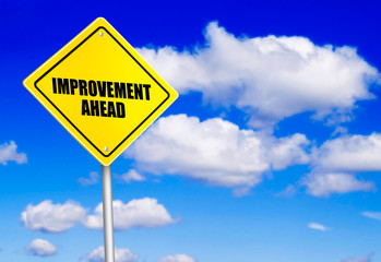 Improvement ahead message on road sign