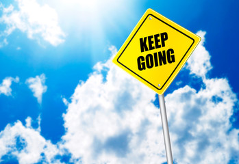 Keep going message on road sign