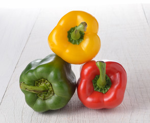 Fresh peppers on wooden