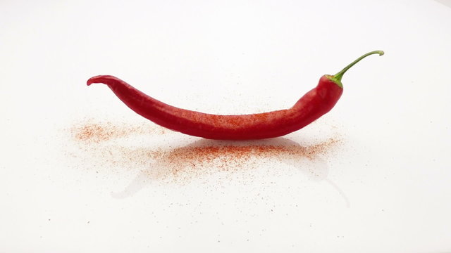 chilli pepper sprinkle with chilli powder slow motion