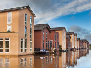 Modern Middle Class Houses along a Canal