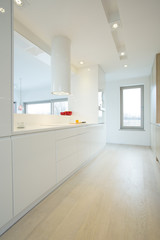 Naklejka na ściany i meble Bright kitchen with white furniture