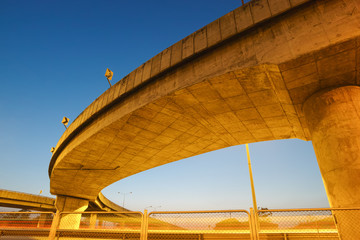 Light trails under highway bridge
