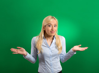 woman arms out shrugs shoulders asking who cares