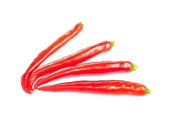 Red hot chili peppers on white background.