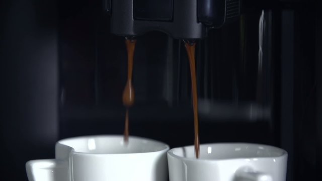Making two cups of coffee