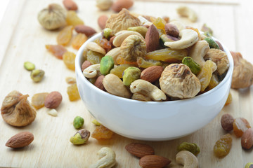 mixed nuts in white bowl