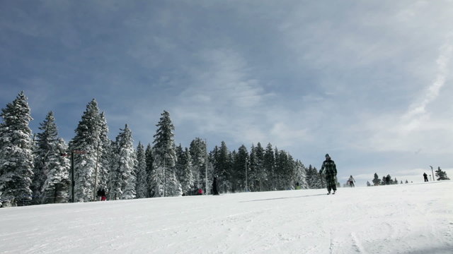 a idyllic ski slope in the winter time full of snow