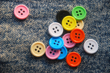 buttons on jeans background