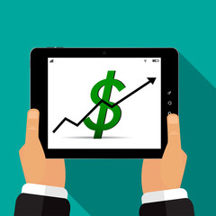The tablet  is in the hands of a rising dollar vector