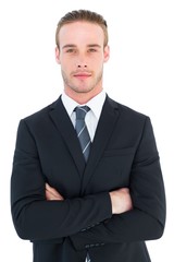 Frowning businessman looking at camera