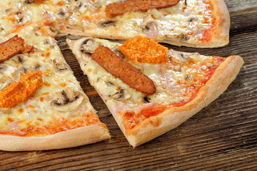Fresh Oven Baked Pizza with ham, Sausage, All Cheese