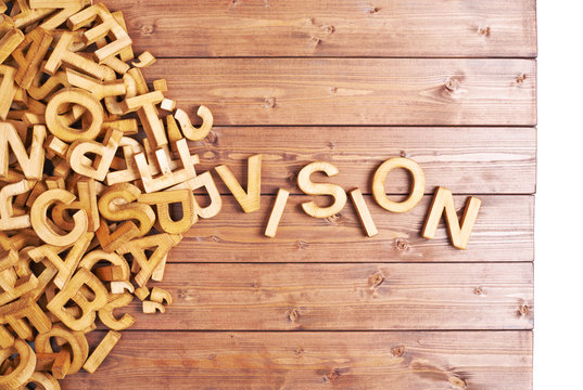 Word vision made with wooden letters