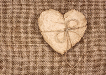 paper heart on a burlap