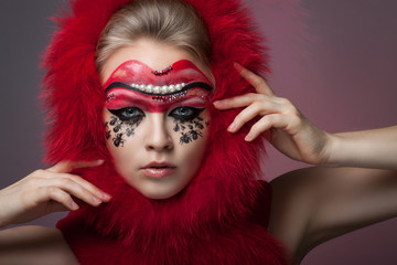 portrait of beautiful girl with creative make-up.