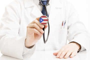 Doctor holding stethoscope with flag series - Puerto Rico