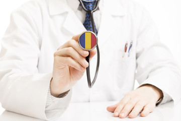 Doctor holding stethoscope with flag series - Romania